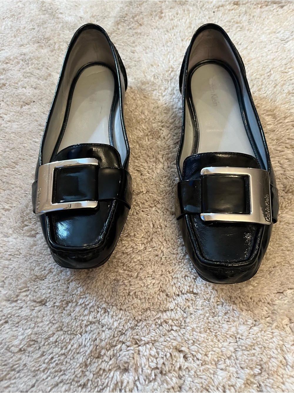 Calvin Klein Black Patent Loafers with Silver Buckle Accent